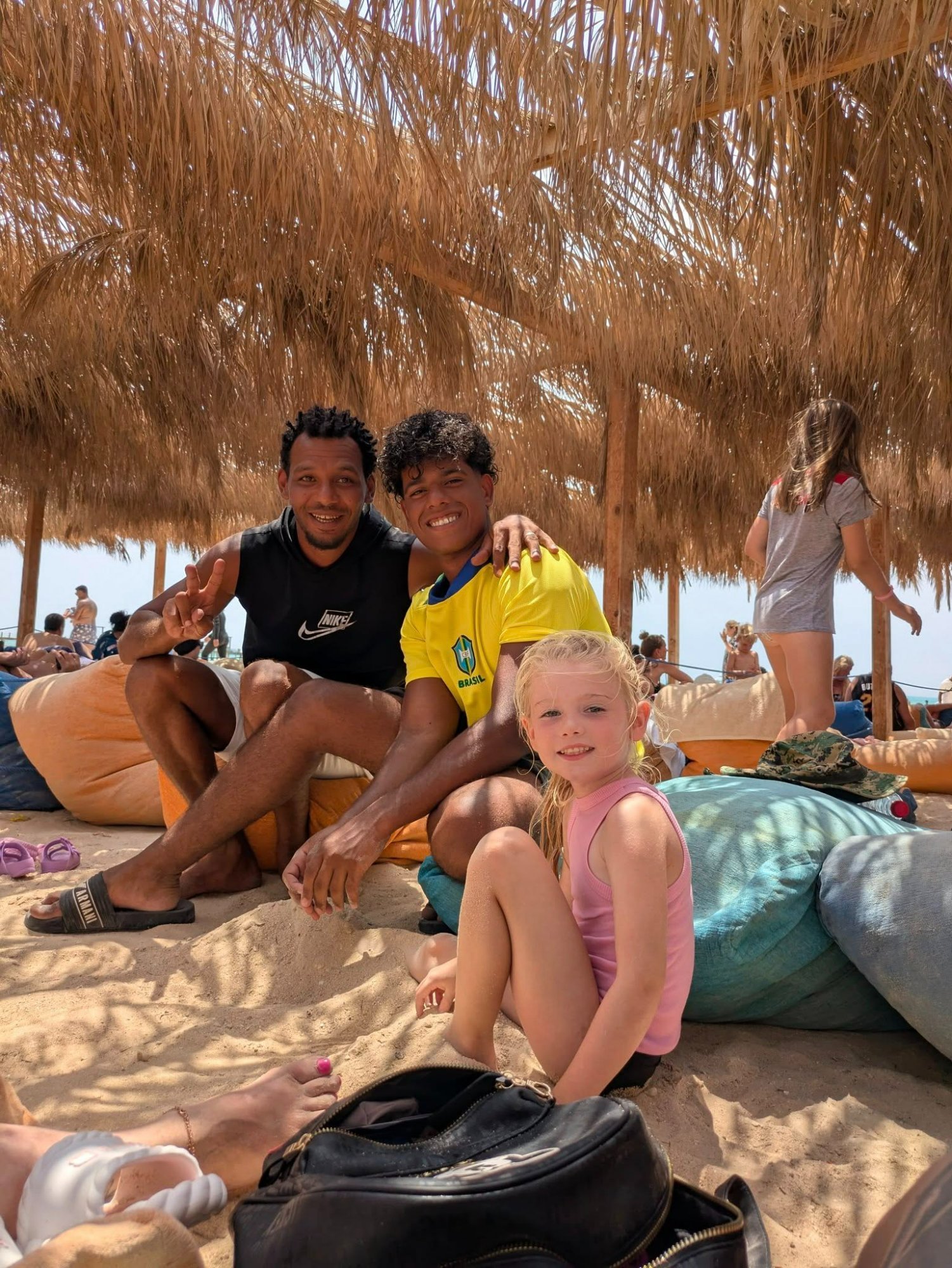 Mohammed Ramadan with family guests on beach
